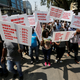 Kenyan taxi drivers signed up to ride-hailing service Uber chant slogans and dance along the streets during a strike after the company slashed prices in the face of growing competition from similar local firms in Kenya's capital Nairobi, August 2, 2016.